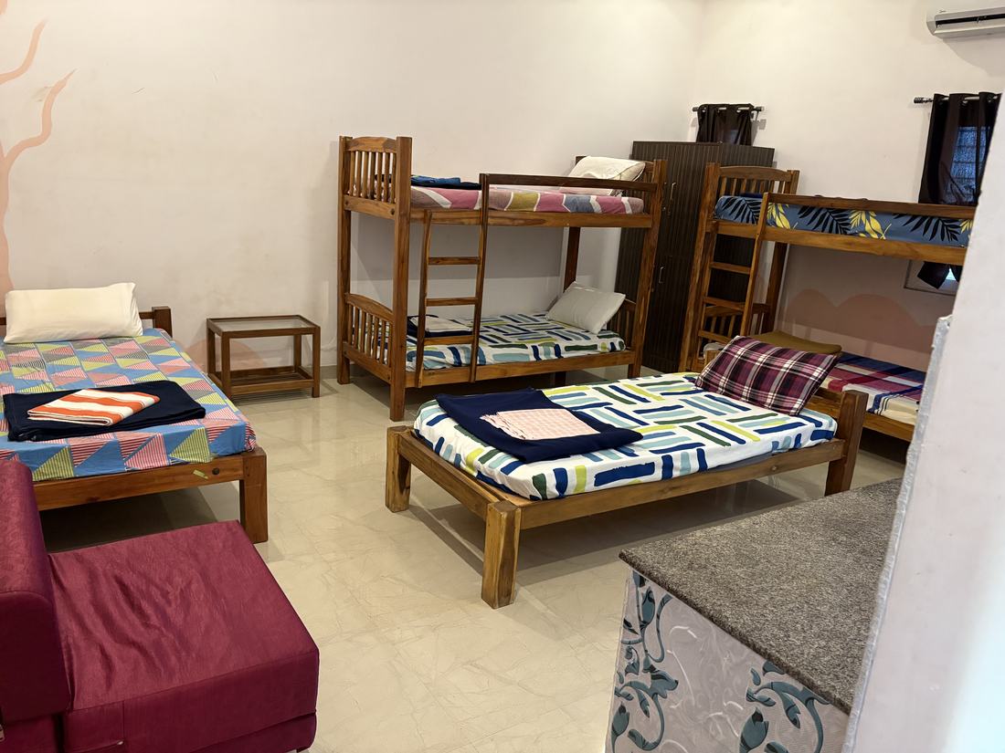 Agni room G3, Art Le Cafe Auroville — single and bunk beds with wardrobe