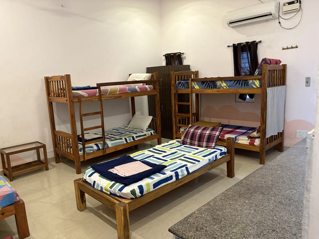Agni room G3, Art Le Cafe Auroville — bunk beds and single bed layout
