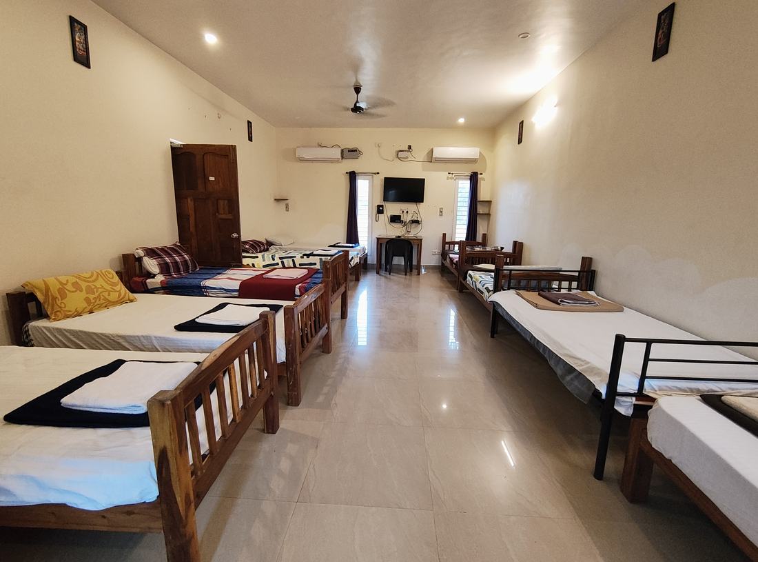 Shambhala dormitory F11, Art Le Cafe Auroville — full dormitory layout