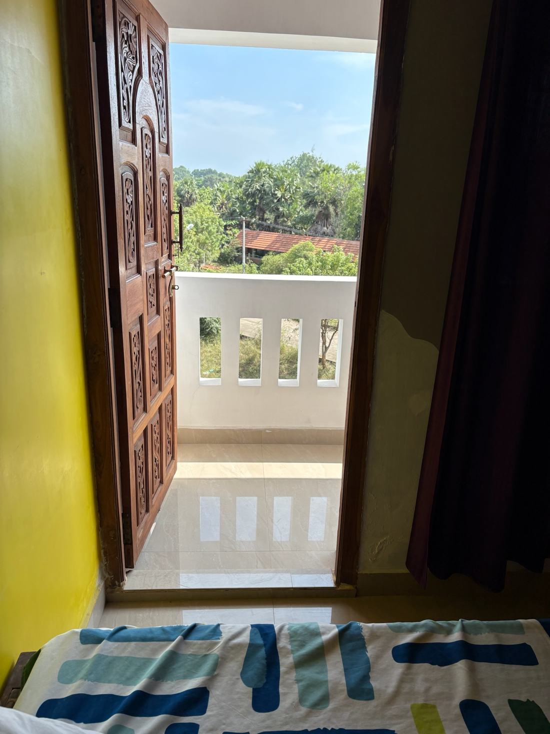Aphrodite room S15, Art Le Cafe Auroville — balcony view