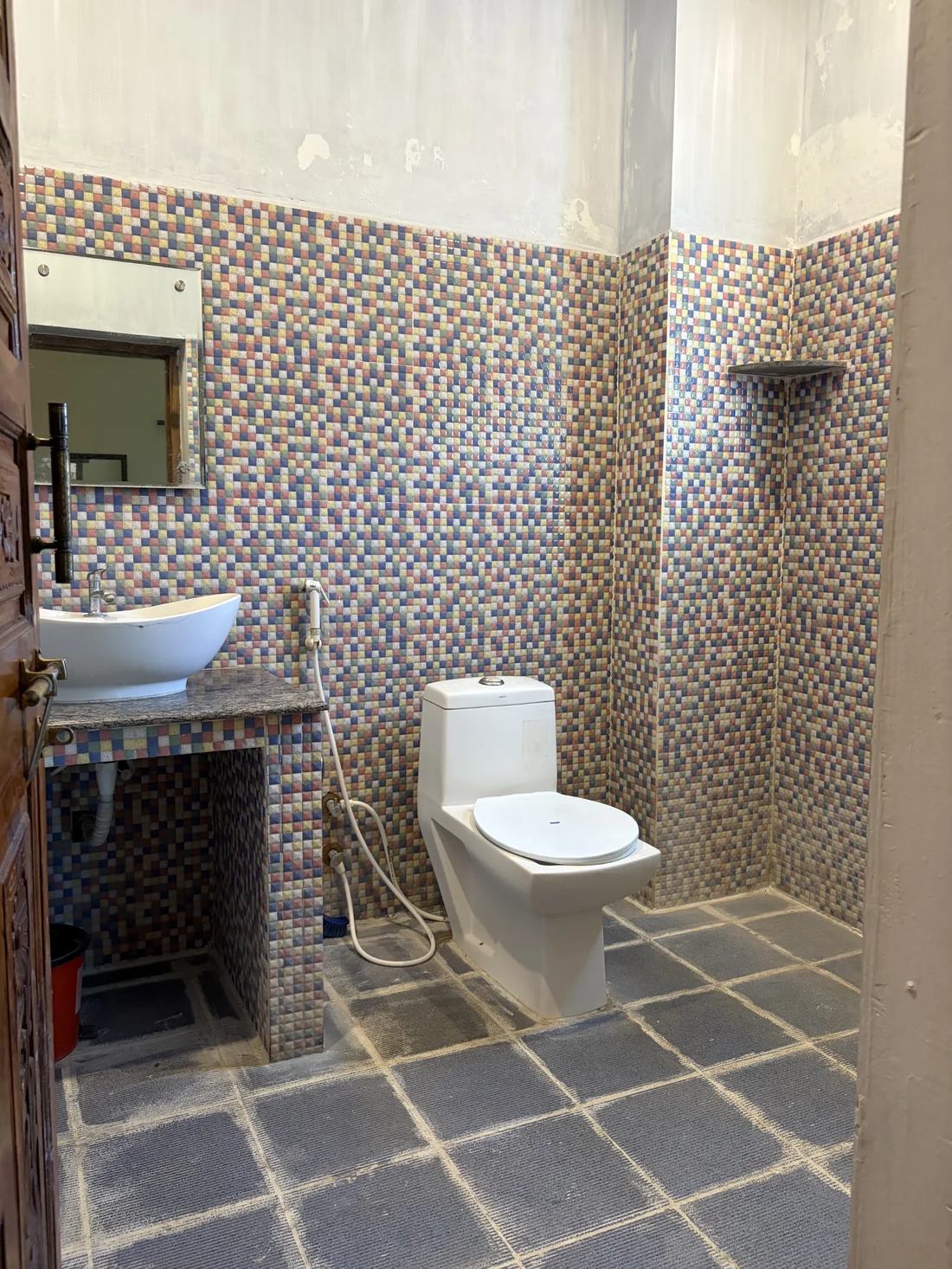 Osiris room S18, Art Le Cafe Auroville — bathroom with sink and toilet