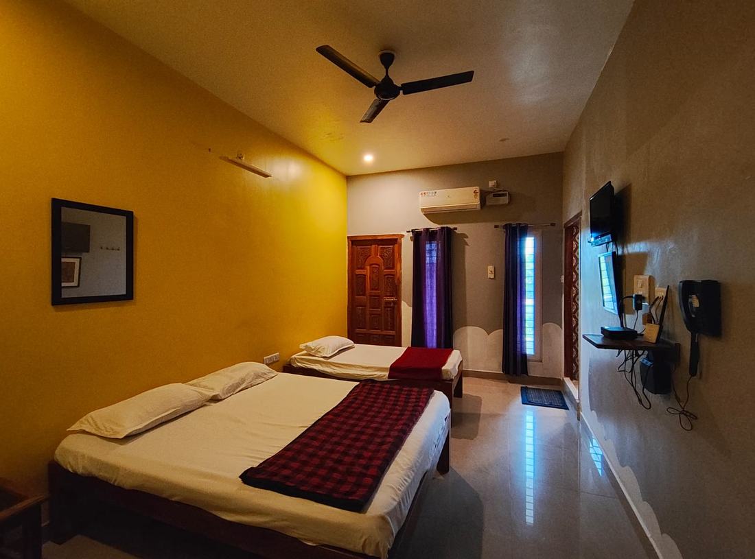 Osiris room S18, Art Le Cafe Auroville — beds and AC