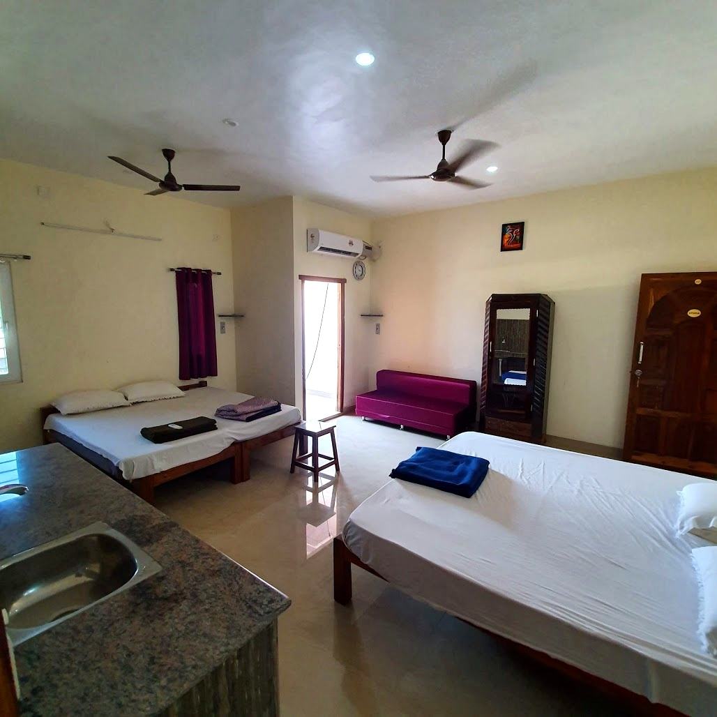 Hera room S19, Art Le Cafe Auroville — pool and lounge area