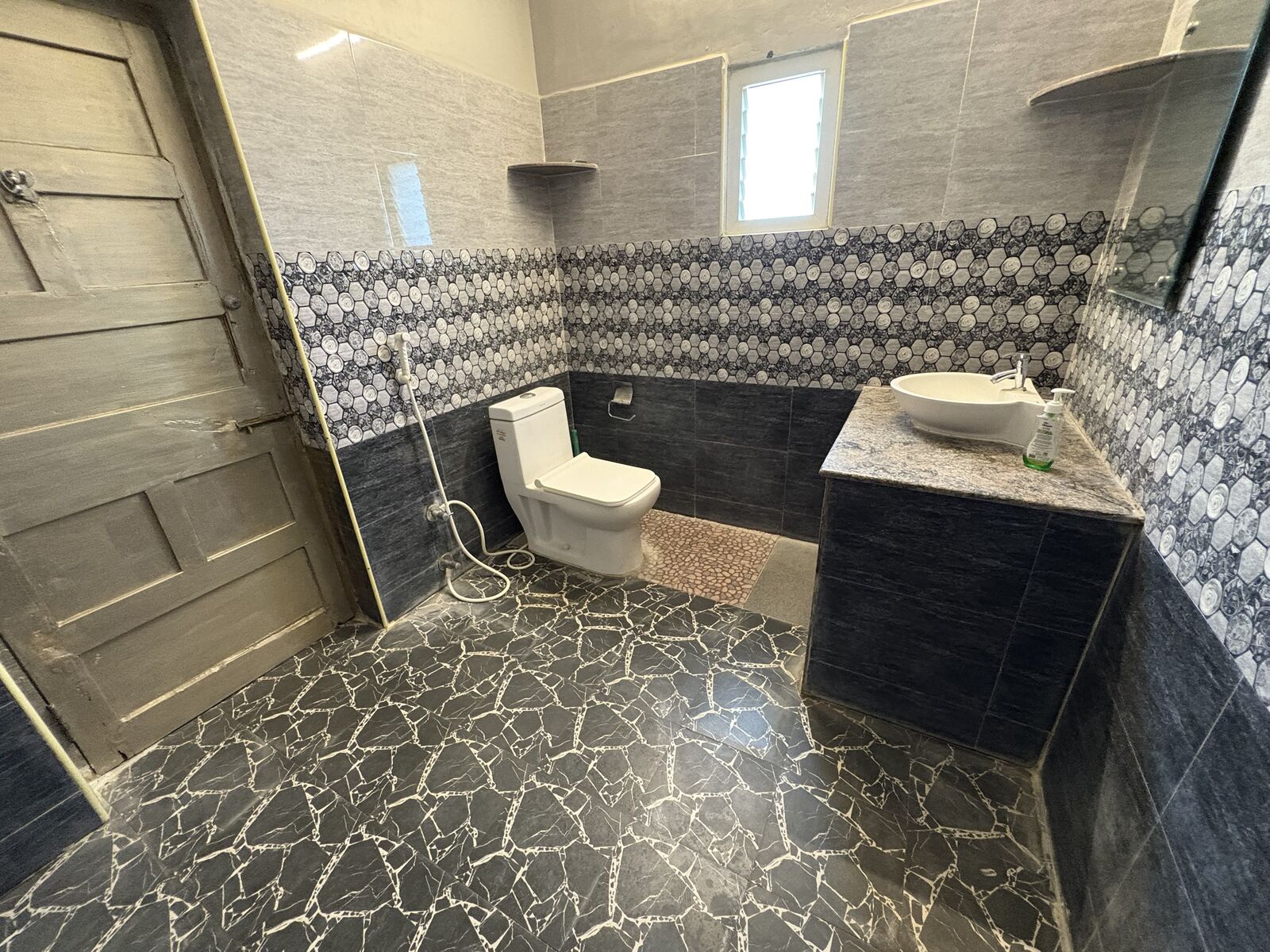 Lakshmi room S22, Art Le Cafe Auroville — bathroom with sink and toilet