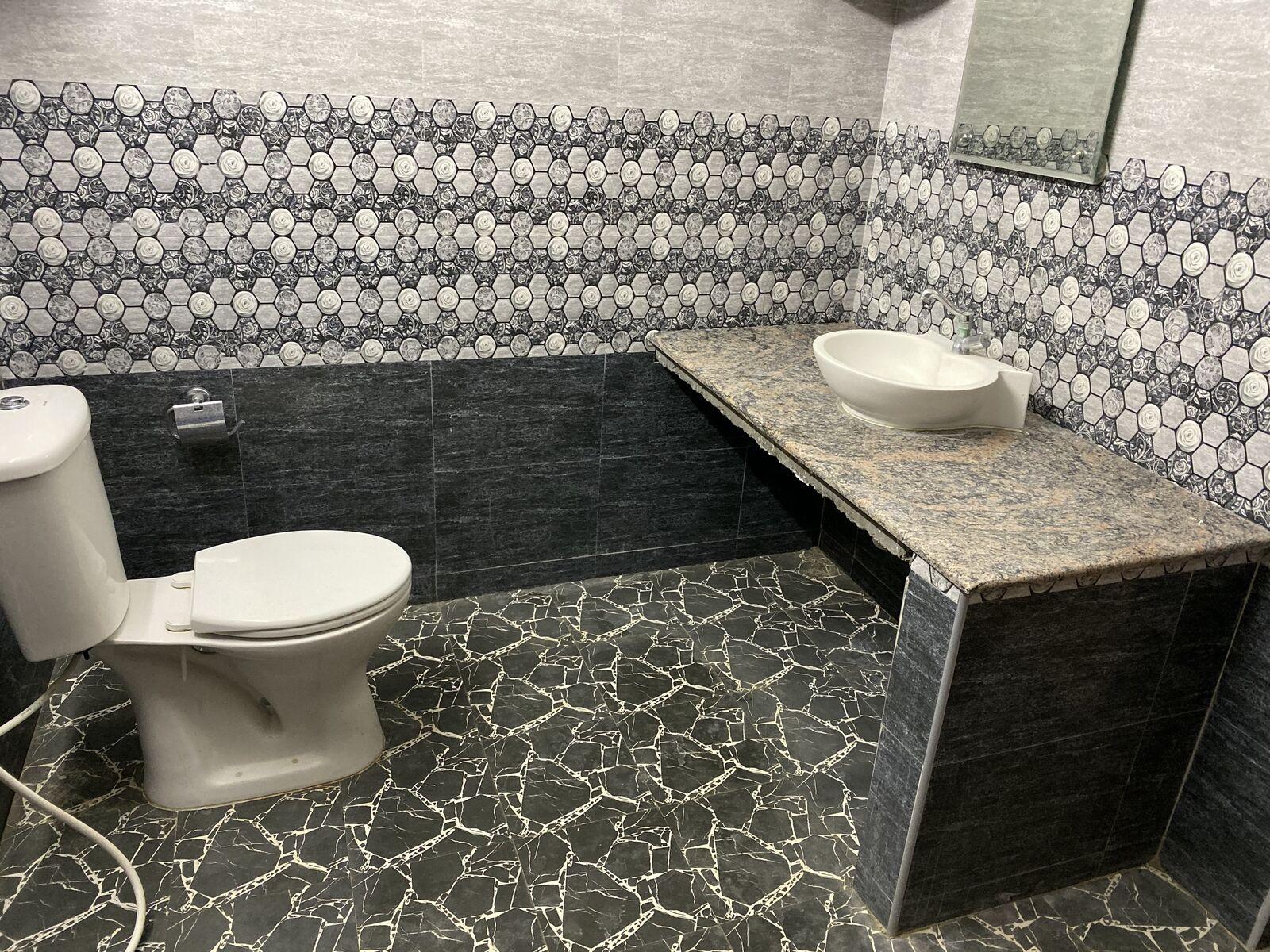 Lakshmi room S22, Art Le Cafe Auroville — modern bathroom with sink and toilet