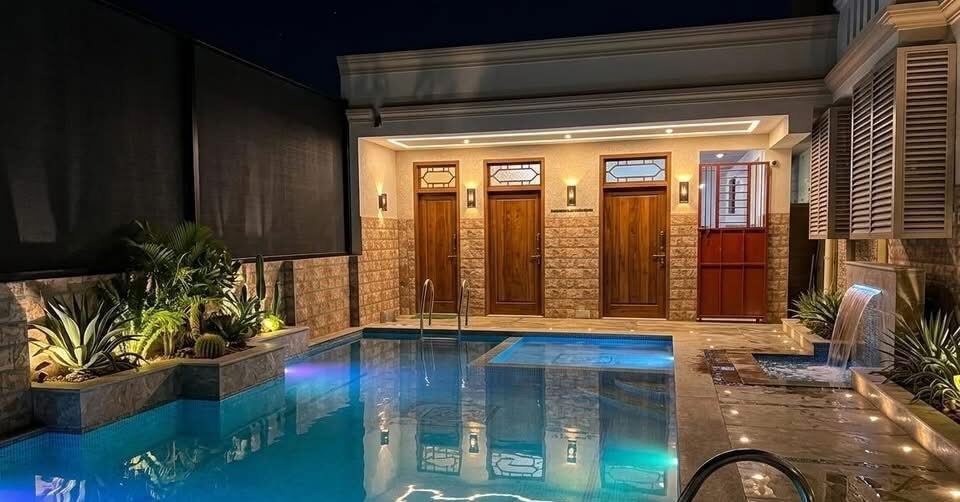 Dhruv room S20, Art Le Cafe Auroville — pool area at night