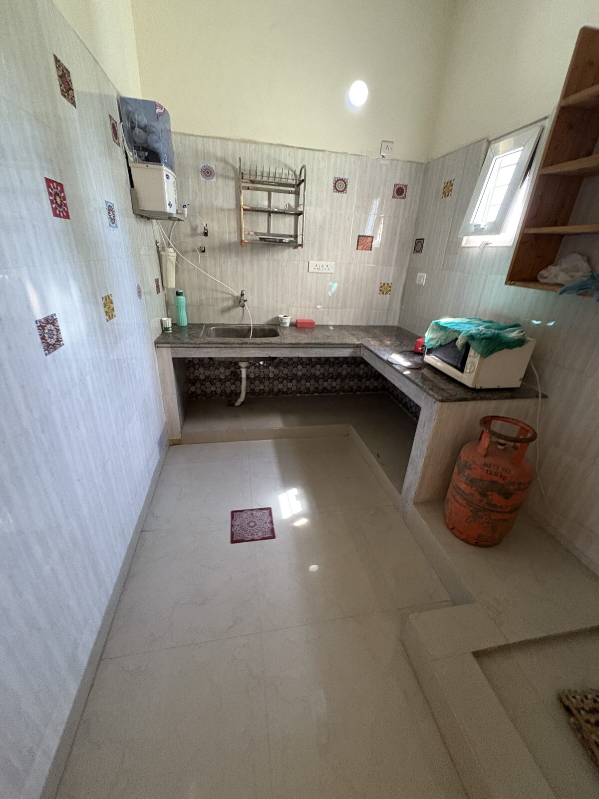 Aditya room S23, Art Le Cafe Auroville — bathroom with sink and toilet